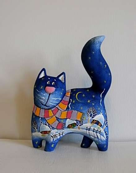 Kitten-Winter-walk,-wood-sculpture-author's-signature---the-kitten