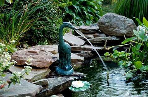 Jade green heron fountain sculpture